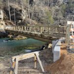 65 foot Gun Barrel Pilings Bolted to Steel Beams